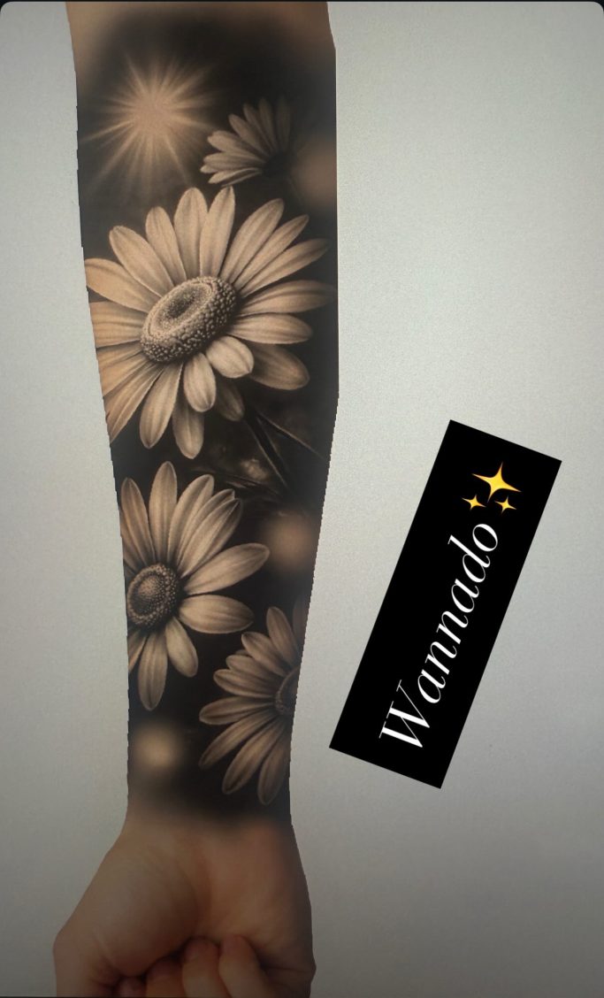  Arm mit floralem Tattoo. - Alice Wonderline Tattoo Wannado